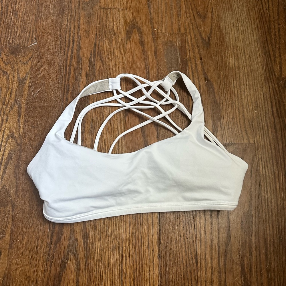Brand new LULULEMON bra. Wore once. Didn’t like how straps felt.